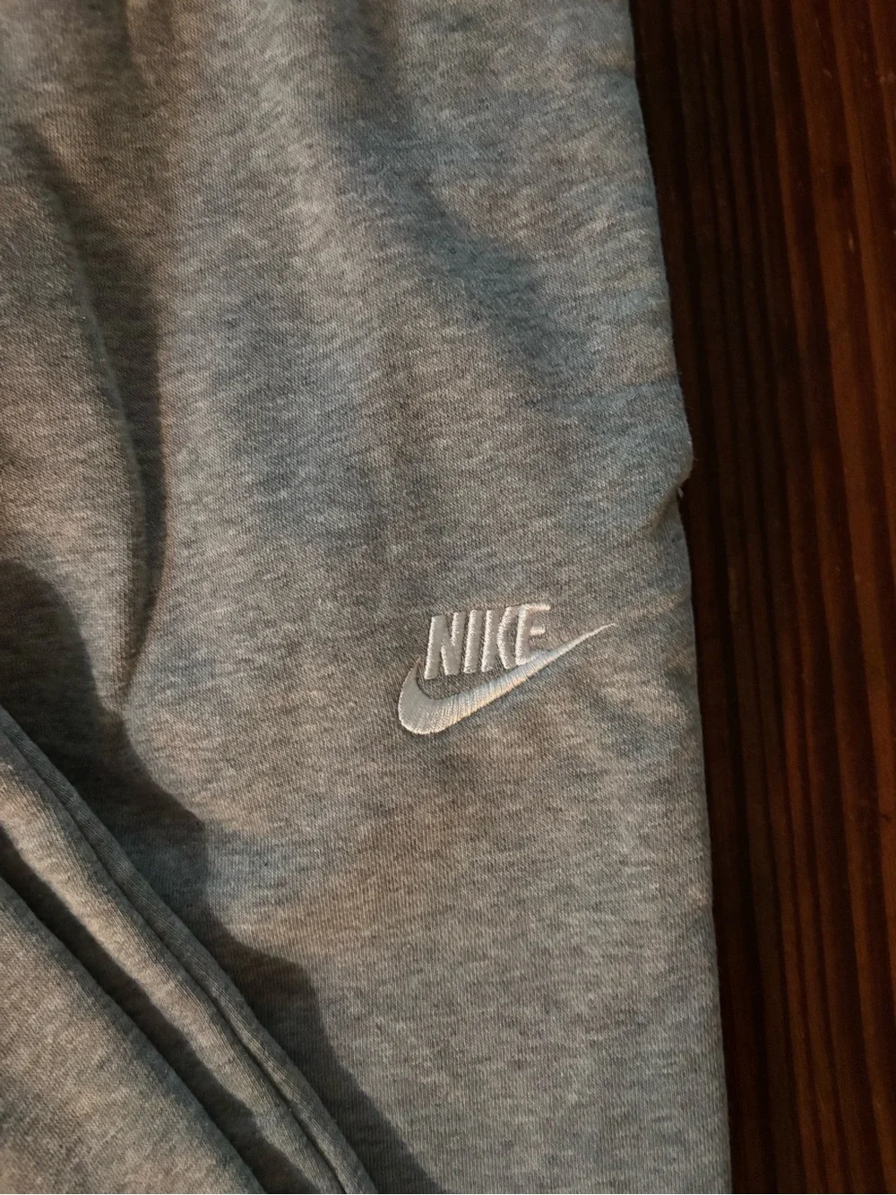 Nike Light Heather Grey Joggers with White Swoosh